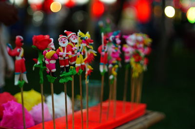 Close-up of santa shaped candies for sale at market