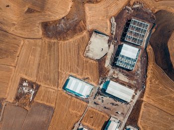 Aerial view of built structures on landscape