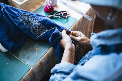 High angle view of man working on table