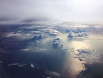 Aerial view of frozen sea against sky