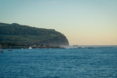 Scenic view of sea against clear sky