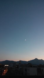 Scenic view of moon against sky at night