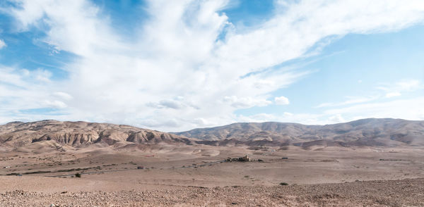 Scenic view of desert against sky