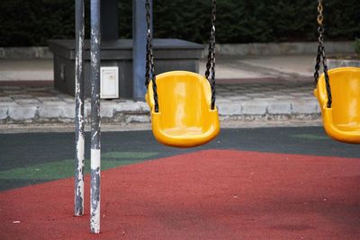 Empty swing in playground