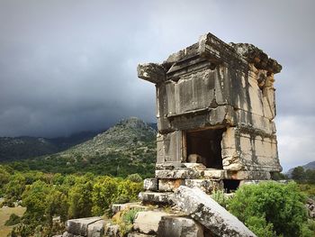 Low angle view of castle against cloudy sky