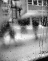 Full frame shot of raindrops on window