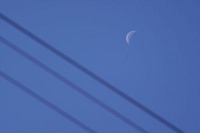 Low angle view of moon in sky