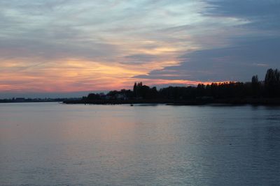 Scenic view of sea at sunset