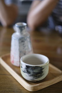 Close-up of tea cup on table