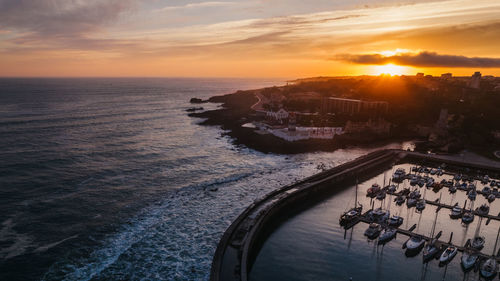 Scenic view of sea against sky during sunset