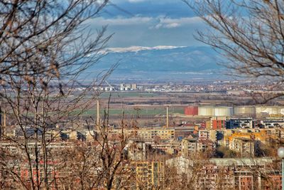 Aerial view of cityscape and mountains