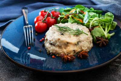 High angle view of meal served in plate on table
