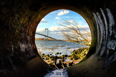 View of sea seen through arch