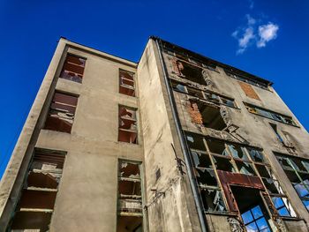 Low angle view of old building against sky