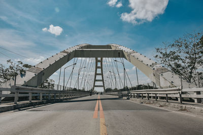 Bridge over road against sky