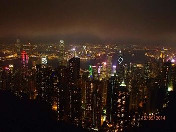 Illuminated cityscape at night