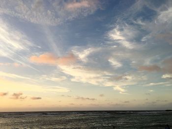 Scenic view of sea at sunset