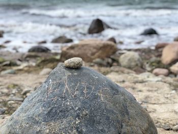 Close-up of stones on beach