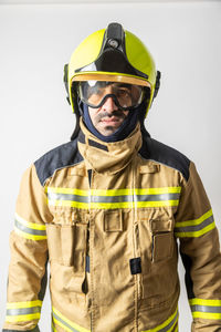 Portrait of young man against white background