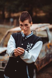 Full length of young man looking at camera