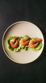 High angle view of salad in plate on table