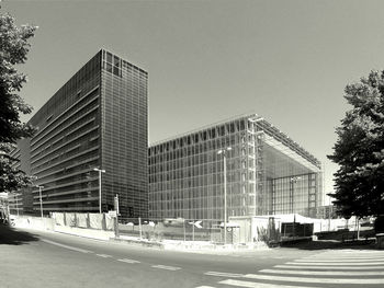 Modern buildings against clear sky in city