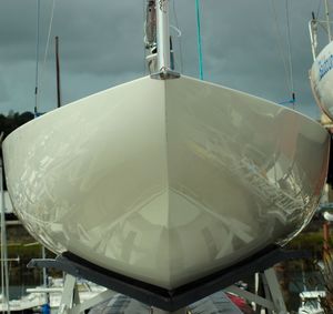 Close-up of boat hanging over water