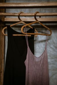 Close-up of clothes hanging on fence