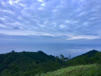 Scenic view of landscape against blue sky