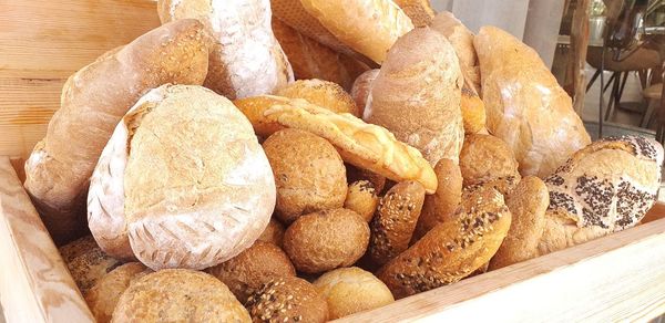 Close-up of bread in wooden container