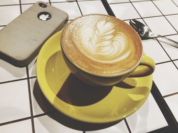 Close-up of cappuccino on table