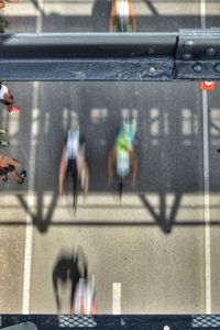High angle view of people running on road