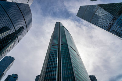 Low angle view of modern buildings against sky