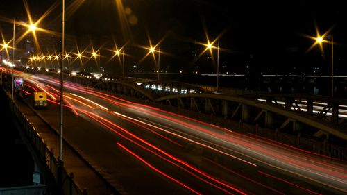 Light trails on road at night