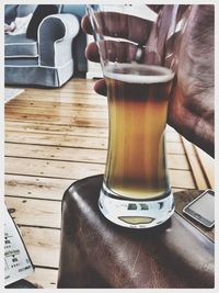 Close-up of beer glass on table