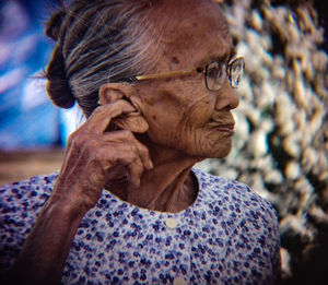 Close-up of senior woman wearing eyeglasses