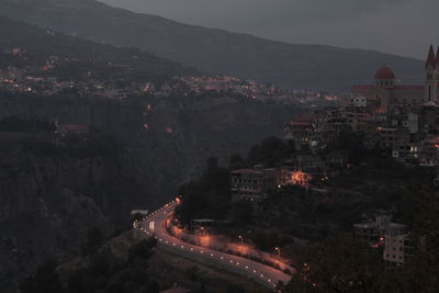 High angle view of illuminated buildings in city