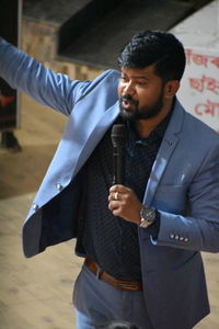 Young man looking at camera