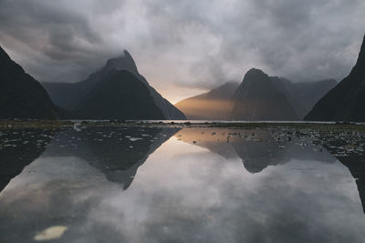 Sunset reflection with mitre peak at milford sound, new zealand