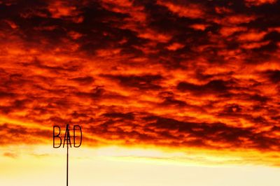 Low angle view of cloudy sky at sunset