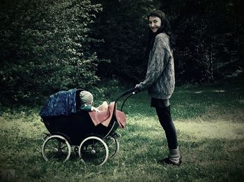 Woman standing on grass