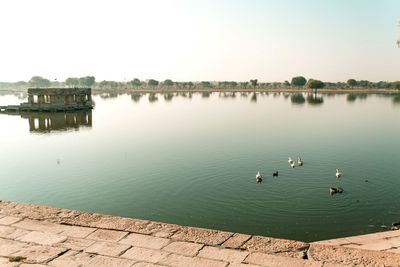 Scenic view of lake against clear sky