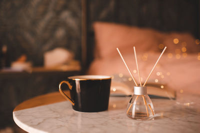 Close-up of coffee cup on table