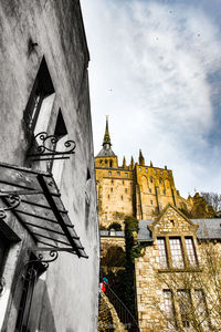 Low angle view of buildings against sky