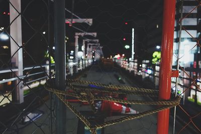 Illuminated city street at night