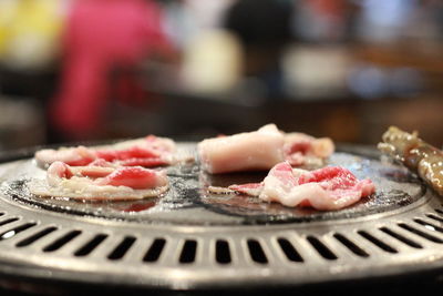 Close-up of food on barbecue grill