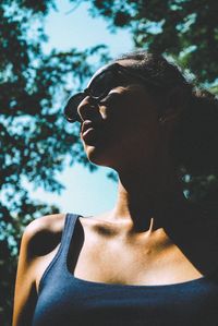 Portrait of young woman wearing sunglasses