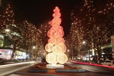 Illuminated street light at night