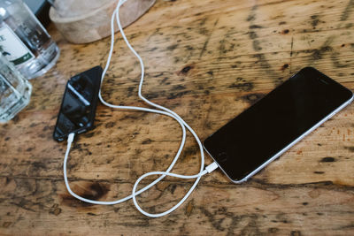 High angle view of mobile phone on table