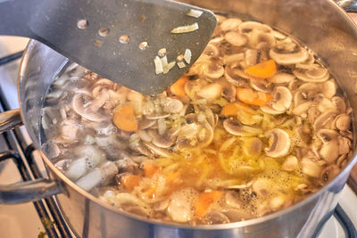 High angle view of meat in cooking pan